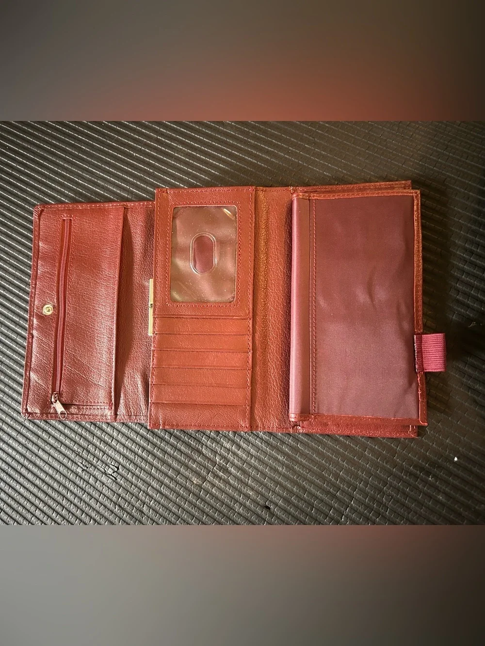 Wilson’s leather, maroon Leather trifold, wallet with Gold Accent